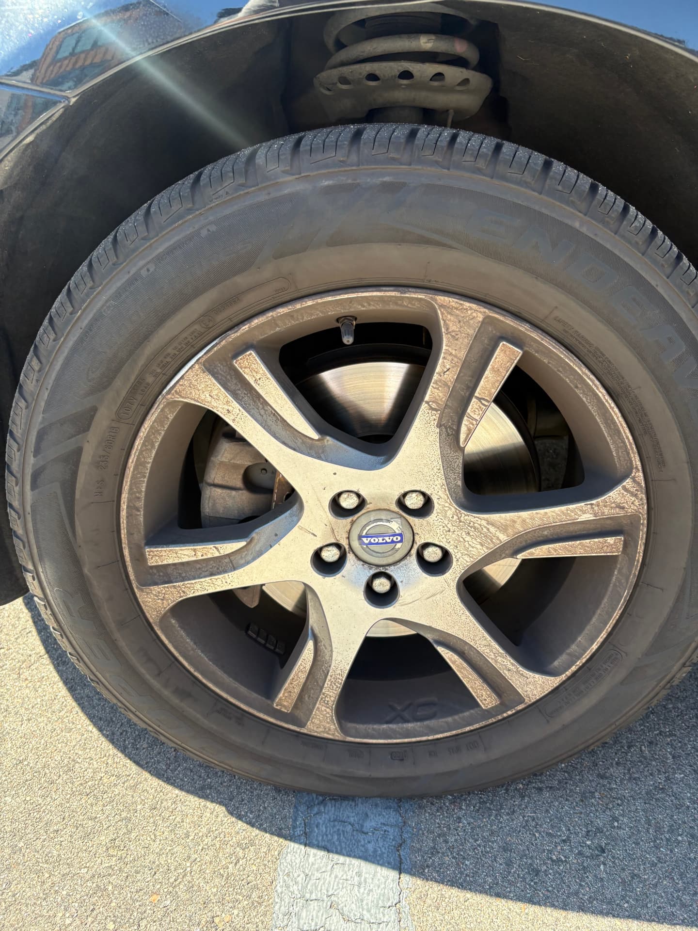 Volvo wheel covered in brake dust before detailing