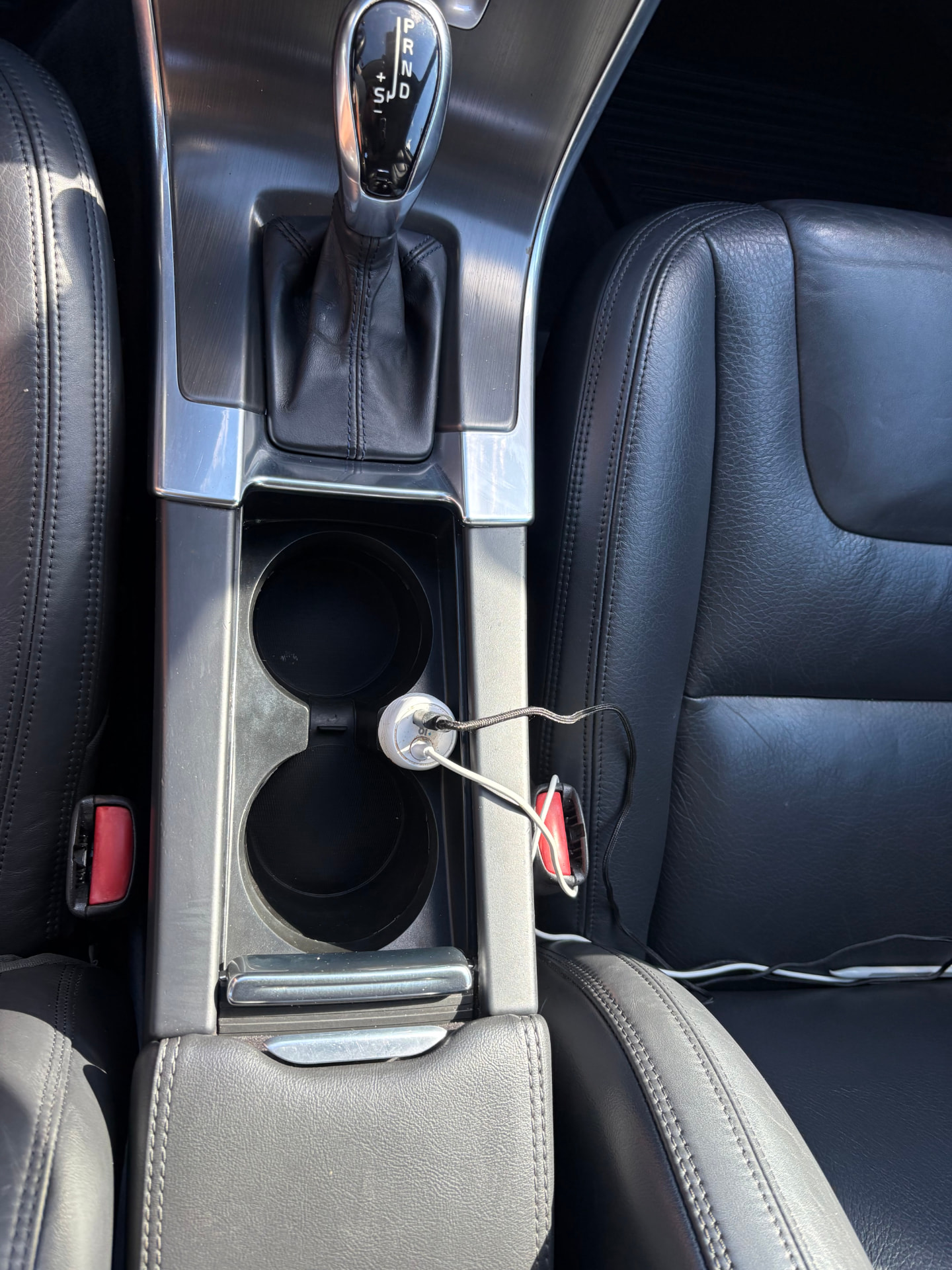 Leather center console after detailing