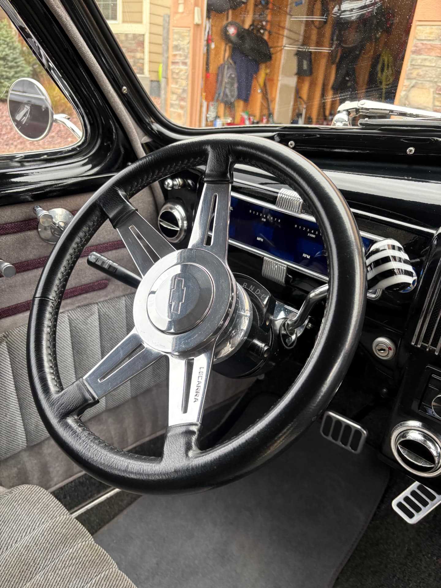 Classic car steering wheel and dashboard after detailing